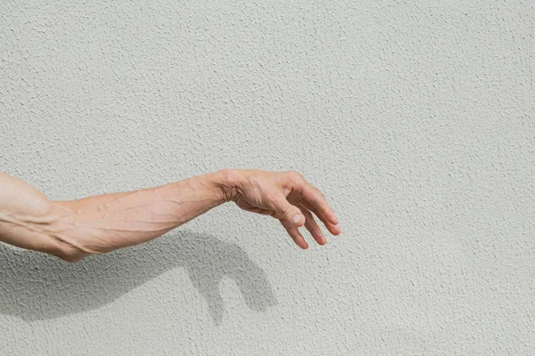 Fragment Mänsklig Hand Vägg Bakgrund — Stockfoto
