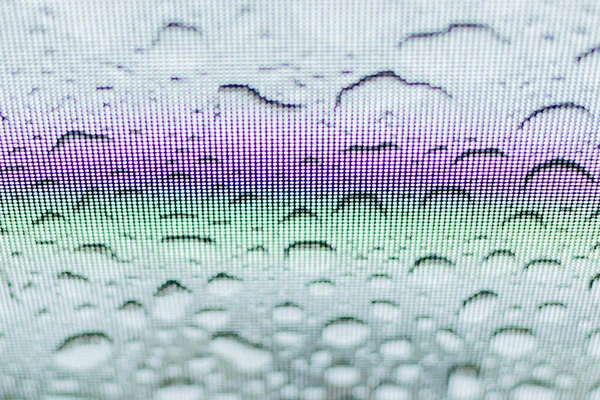 Regnbåge på glasluckan i bilen — Stockfoto