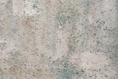 Boyalarla boyanmış eski tuğla duvar.