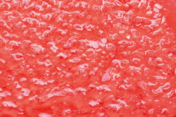 Derretendo Gelo Fundo Vermelho — Fotografia de Stock