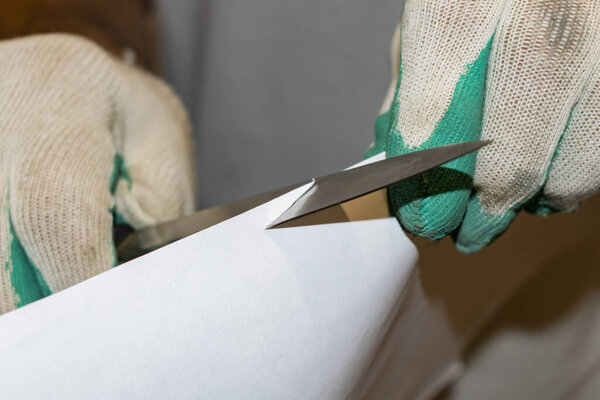 The master makes sharpening knives