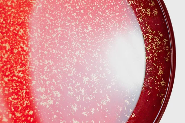 輝く赤い液体のイメージのコラージュ — ストック写真