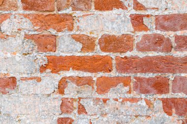 Terk edilmiş eski bir binanın tuğla duvarının dokusu