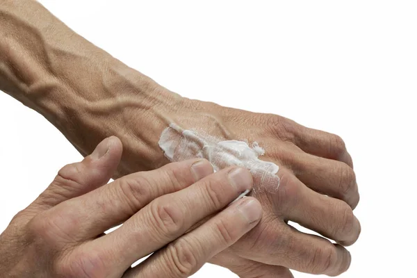 Homem Esfrega Mãos Com Creme Branco Depois Trabalho — Fotografia de Stock