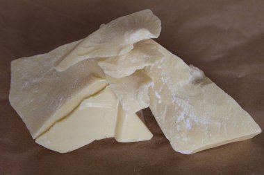 Parşömen arka plan üzerine kakao tereyağı