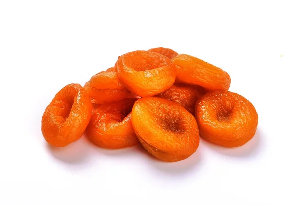 Dried apricots on a white — Stock Photo, Image