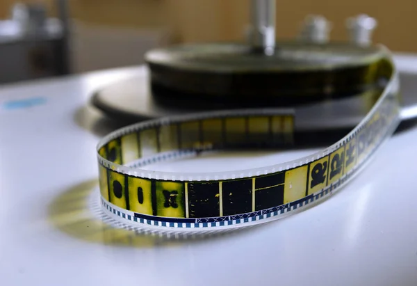 Film strip on the pasteboard — Stock Photo, Image