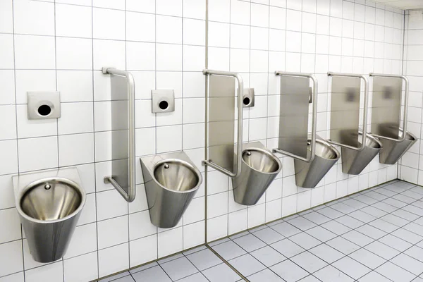 Urinals in men's public modern toilet restroom sanitary or wc ar — Stock Photo, Image