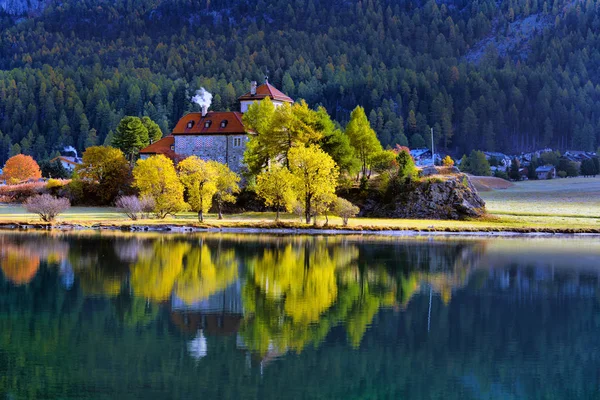 Mountain lake panorama with mountains reflection. Idyllic look.