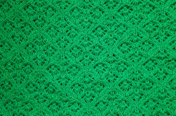 Green abstract texture, background. Green knitted texture for design lose up