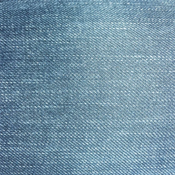 Tessile vecchio stile. Sfondo disegno denim. Tessuto di industria bello. Texture motivo denim originale. Jeans blu in tessuto. Jeans super vintage. Macro denim . — Foto Stock