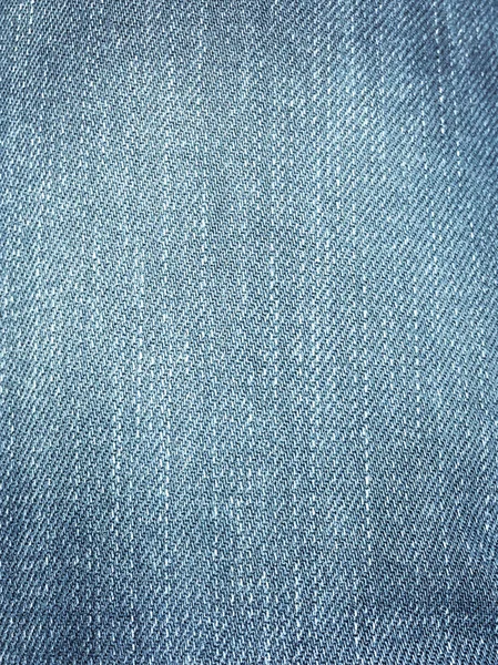 Tekstil gaya lama. Latar belakang desain Denim. Industri kain yang indah. Tekstur asli denim pola. Celana jeans biru tekstil denim. Bahan jeans vintage super. Makro Denim . — Stok Foto