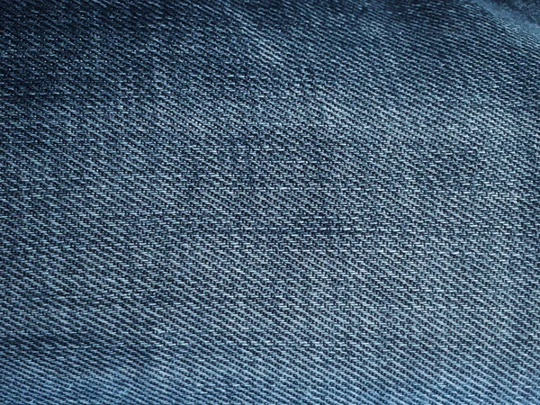 Old style textile. Denim design background. Industry fabric beautiful. Texture original denim pattern. Textile blue jeans denims. Super vintage jeans material. Denim macro.