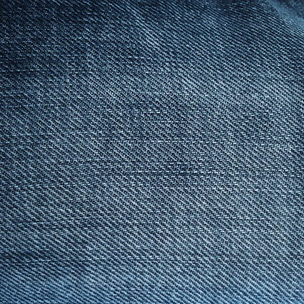 Tessile vecchio stile. Sfondo disegno denim. Tessuto di industria bello. Texture motivo denim originale. Jeans blu in tessuto. Jeans super vintage. Macro denim . — Foto Stock