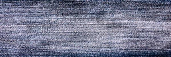 Tessile vecchio stile. Sfondo disegno denim. Tessuto di industria bello. Texture motivo denim originale. Jeans blu in tessuto. Jeans super vintage. Macro denim . — Foto Stock