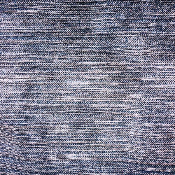 Tessile vecchio stile. Sfondo disegno denim. Tessuto di industria bello. Texture motivo denim originale. Jeans blu in tessuto. Jeans super vintage. Macro denim . — Foto Stock