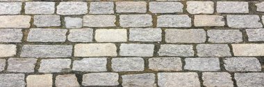 Taş kaldırım dokusu. Granit cobblestoned kaldırım arka plan. Arka plan eski kaldırım taşı kaldırım yakın çekim. Sorunsuz kaldırım doku