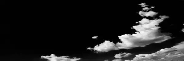 Clouds. Black Background. Isolated white clouds on black sky. Set of isolated clouds over black background. Design elements. White isolated clouds. Cutout extracted clouds — Stock Photo, Image