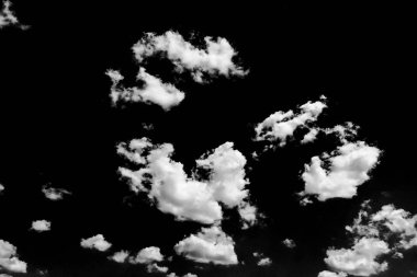 Isolated white clouds on black sky. Set of isolated clouds over black background. Design elements. White isolated clouds. Cutout extracted clouds. Clouds.Black Background. clipart