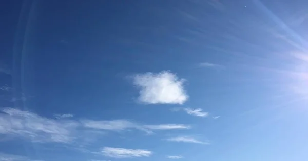 Beautiful blue sky with clouds background.Sky clouds.Sky with clouds weather nature cloud blue.Blue sky with clouds and sun. — Stock Photo, Image