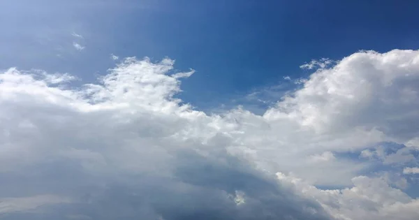 Beautiful blue sky with clouds background.Sky with clouds weather nature cloud blue.Blue sky with clouds and sun. — Stock Photo, Image