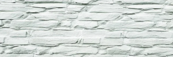 Stone wall background. White painted stone wall texture as background. Wood background wall painting