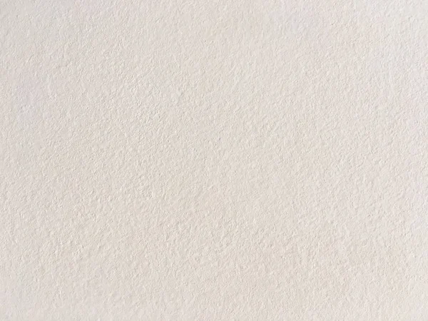 Grungy painted wall texture as background. Cracked concrete vintage wall background, old white painted wall. Background white painting.