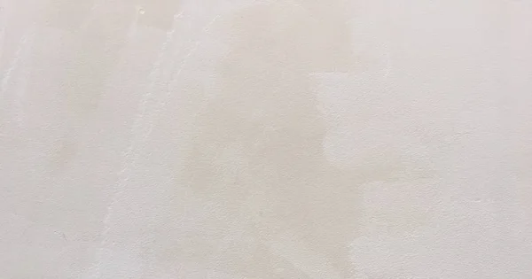 Грэмми расписал текстуру стен в качестве фона. Расколотый бетонный винтажный фон, старая белая покрашенная стена. Фон белой живописи . — стоковое фото