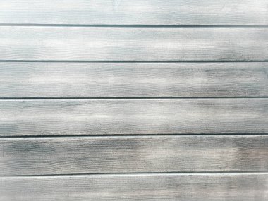 Arka plan olarak hafif ahşap yüzey, ahşap doku. Grunge ahşap tahtaları yıkadı. Masanın üst görüntüsü..