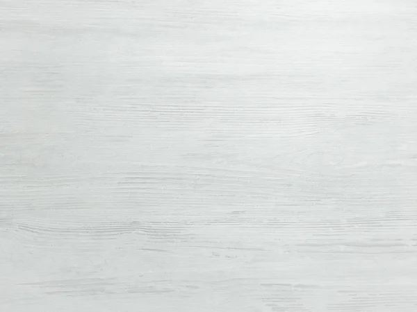 Arka plan olarak hafif ahşap yüzey, ahşap doku. Grunge ahşap tahtaları yıkadı. Masanın üst görüntüsü..