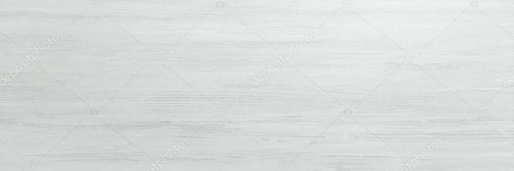 Light soft wood surface as background, wood texture. Grunge washed wood planks table pattern top view.