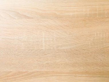 Arka plan olarak hafif yumuşak ahşap doku yüzeyi. Grunge ahşap ahşap masa desenli üst görünüm yıkadı.