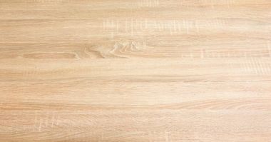 Arka plan olarak hafif yumuşak ahşap doku yüzeyi. Grunge ahşap ahşap masa desenli üst görünüm yıkadı.