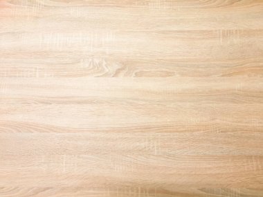 Arka plan olarak hafif kahverengi yumuşak vernikli ahşap doku yüzey. Ahşap plakalar tablo desen üstten görünüm yıkanmış grunge.