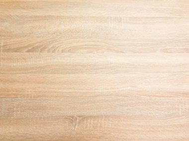Arka plan olarak hafif kahverengi yumuşak vernikli ahşap doku yüzey. Ahşap plakalar tablo desen üstten görünüm yıkanmış grunge.