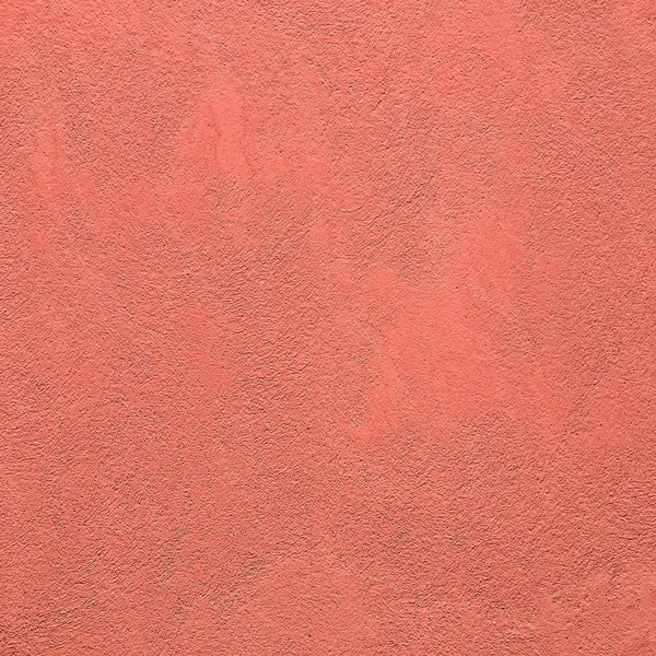 Grunzig bemalte Wandtextur als Hintergrund. Rissiger Betonboden, alt rot gestrichen. Hintergrund gewaschene Malerei. — Stockfoto