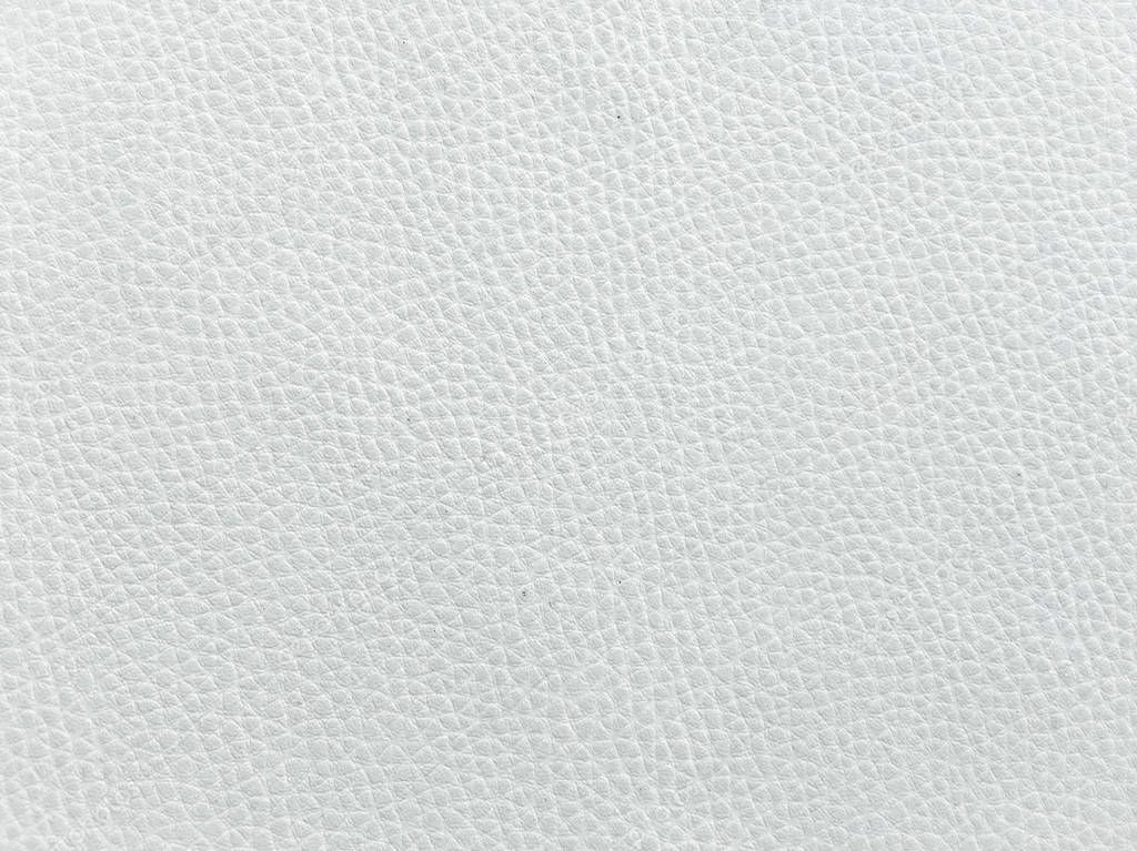 Closeup of seamless white leather texture. Background with texture of white leather. Beige leather texture, white cow skin for background.