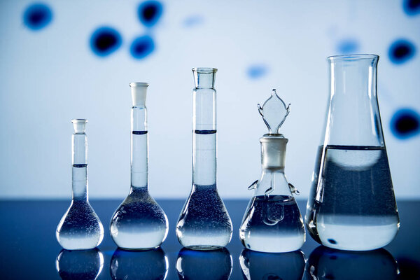 Laboratory equipment, lots of glass filled with colorful liquids