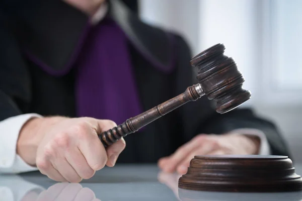 Justice and law concept. Male judge in a courtroom with the gavel and working with book — Stock Photo, Image