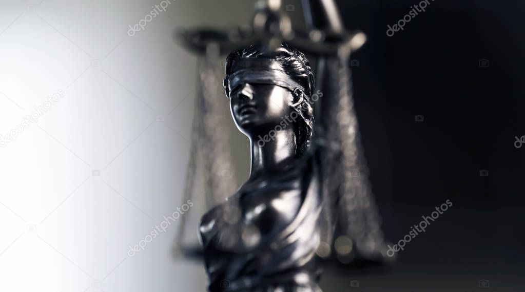 Legal office of lawyer. legal model statue of Themis goddess of justice.