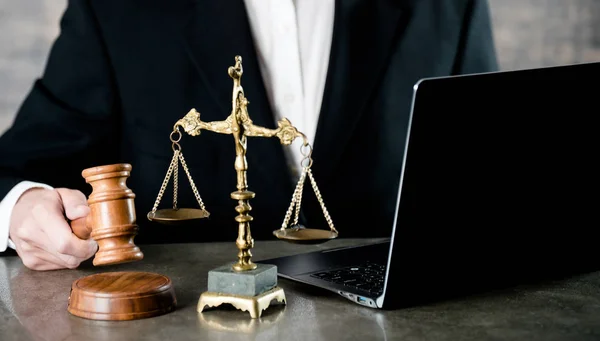 lawyer or judge work in the office with gavel and balance