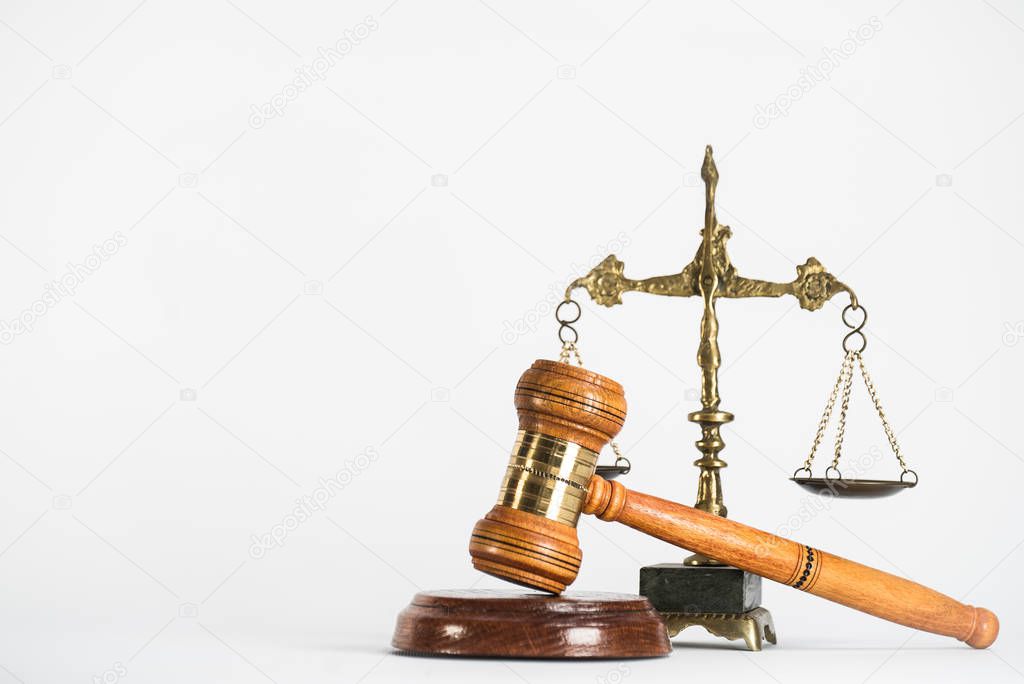 Symbols of law and justice isolated on white background