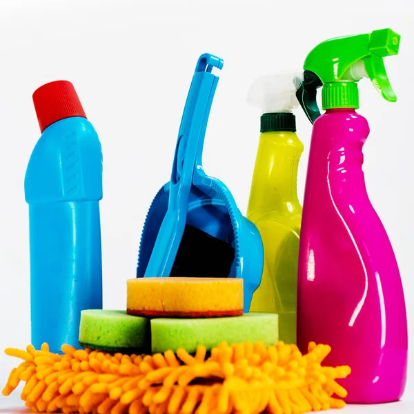 Colourful tools for cleaning. Household cleaning concept. Cleaning kit isolated on white background.