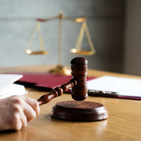 Hand Holding Gavel Reading Book Scales Justice Background Legal Law — Stock Photo, Image