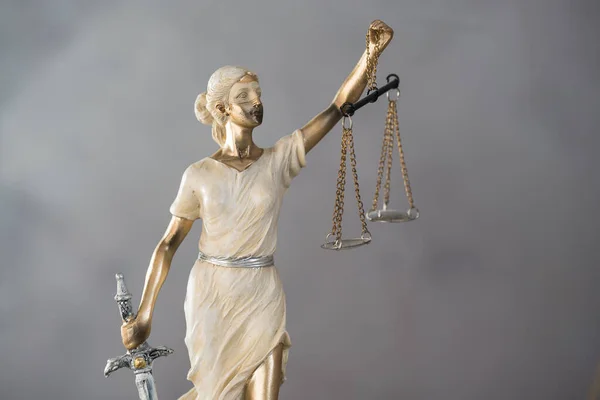 Statue of Justice with libra, court and law theme background