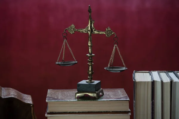 scale of justice with books on background, law and judge concept
