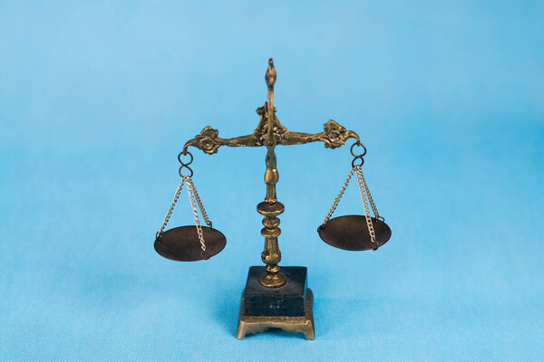 Closeup of balance scales, weight balance. Law and justice concept