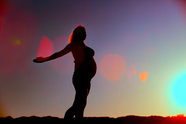 Silhouette of pregnant woman — Stock Photo, Image