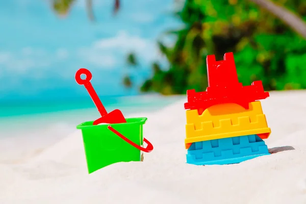 Kid toys on tropical sand beach — Stock Photo, Image