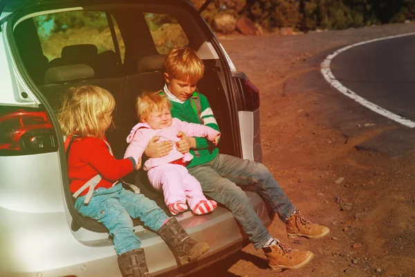 family car travel - happy kids on the road